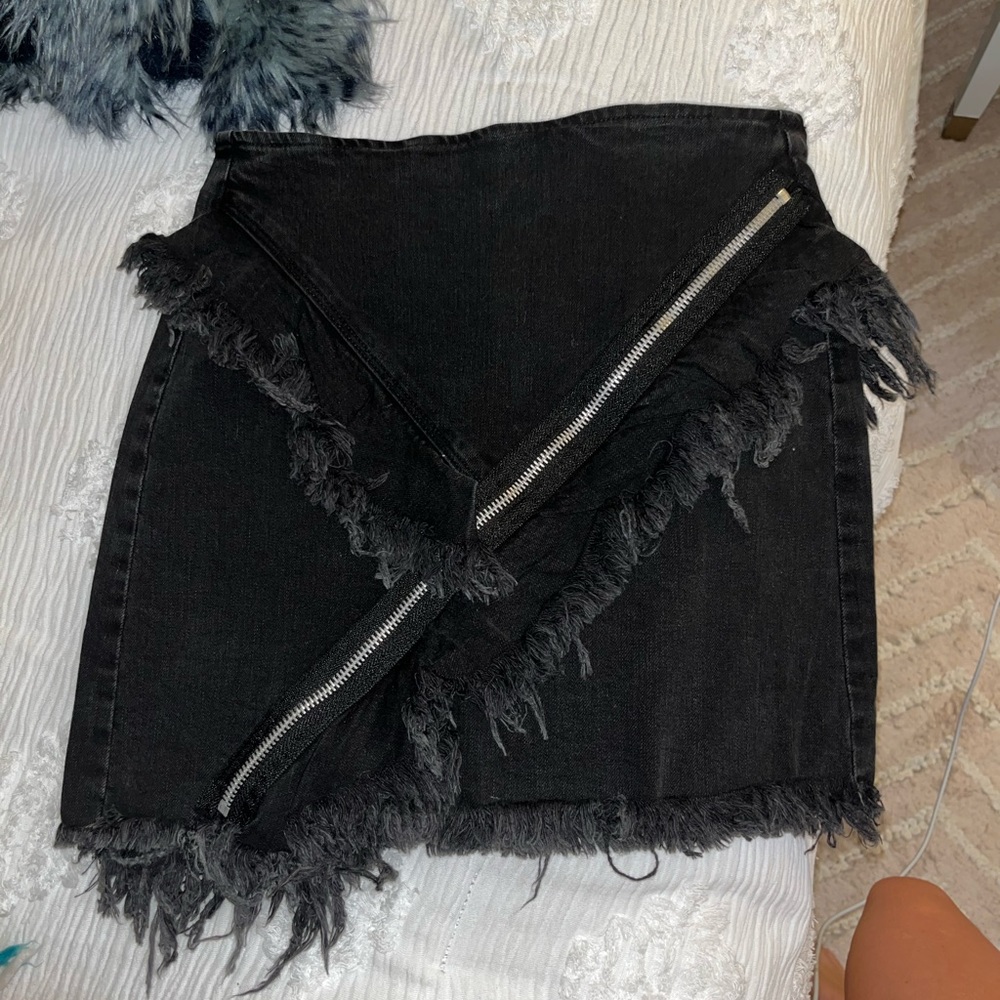 Fringed black skirt